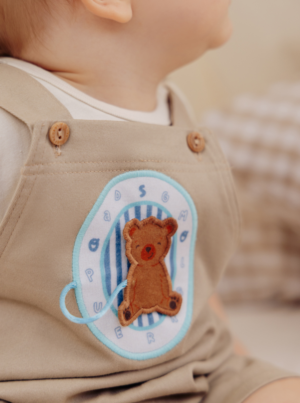 Baby boy sensory-friendly adjustable strap overalls